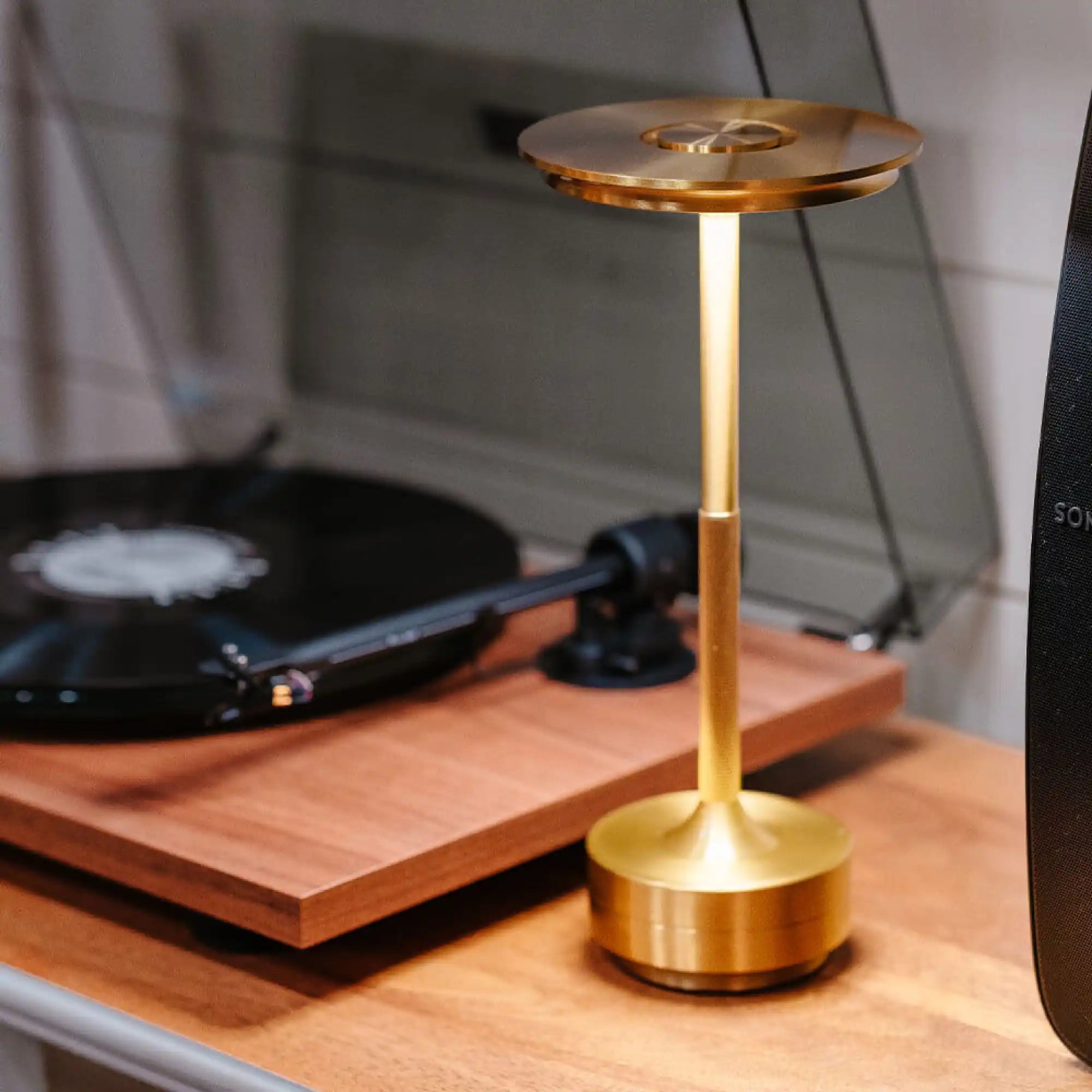 brass-finished-cylindrical-led-table-lamp-flat-circular.webp