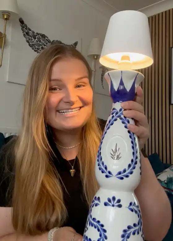 decorative-bottle-lamp-white-lampshade-blue-floral-patterns.webp