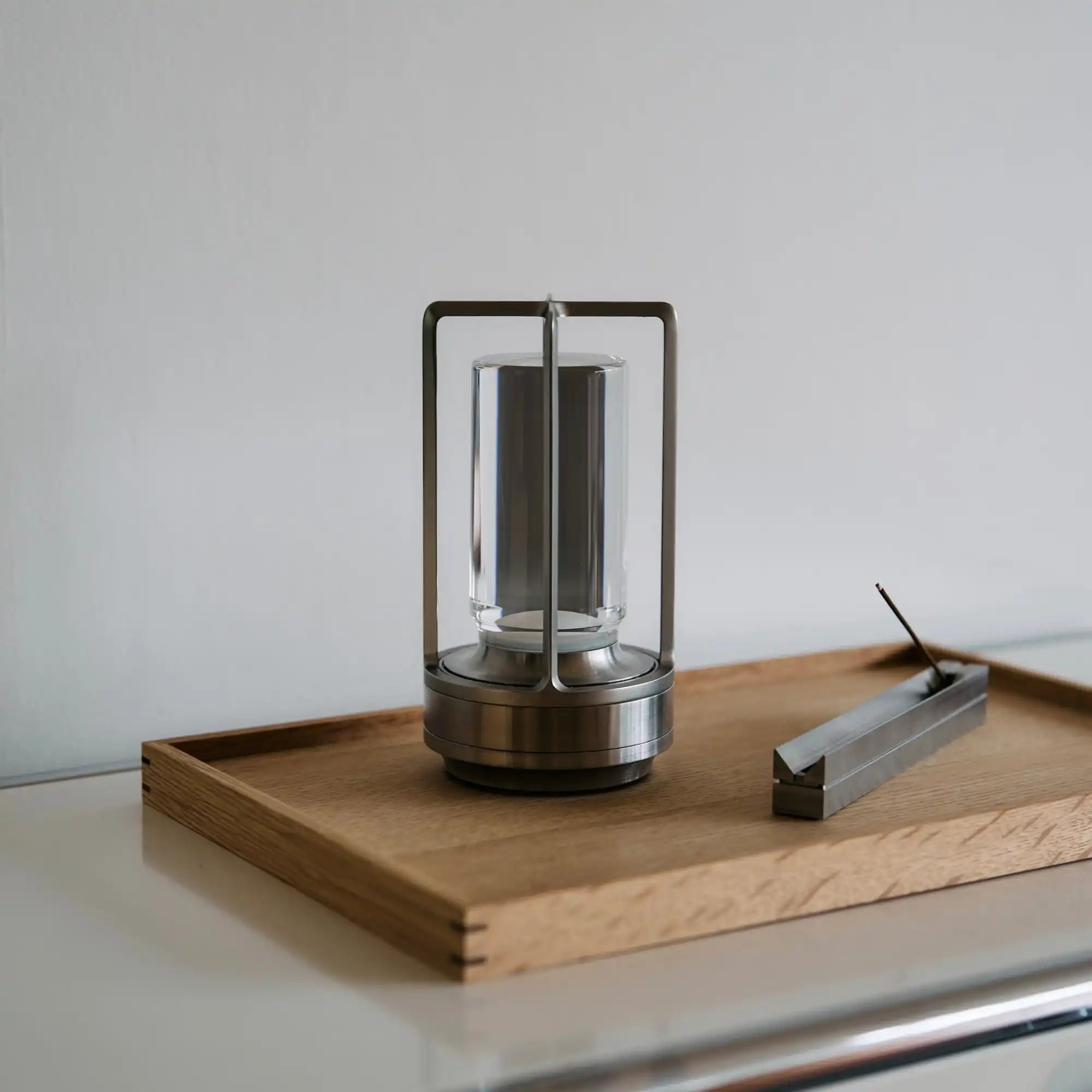 modern-minimalist-lantern-clear-glass-shade-brushed-metal-frame.webp